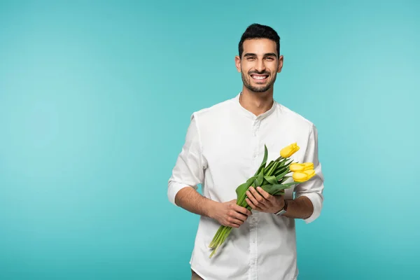 Positive Arabian Man Holding Tulip Flowers Isolated Blue — Stock Photo, Image