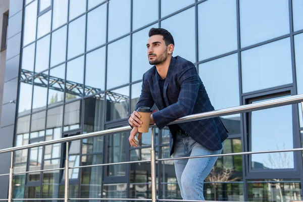 Young Muslim Businessman Takeaway Drink Looking Away Railing Outdoors — Stock Photo, Image
