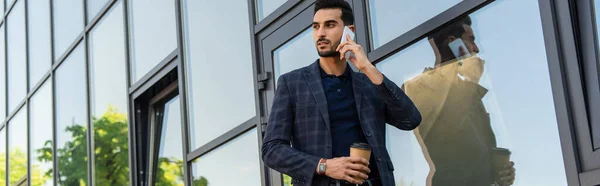 Arabian Businessman Talking Smartphone Holding Coffee Building Banner — Zdjęcie stockowe