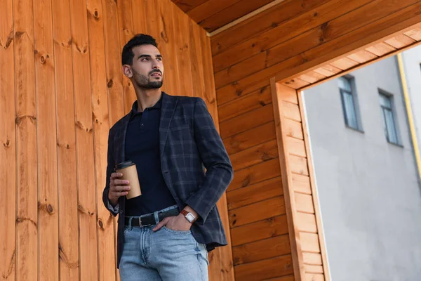 Arabian Businessman Holding Hand Pocket Jeans Paper Cup Outdoors — Stockfoto