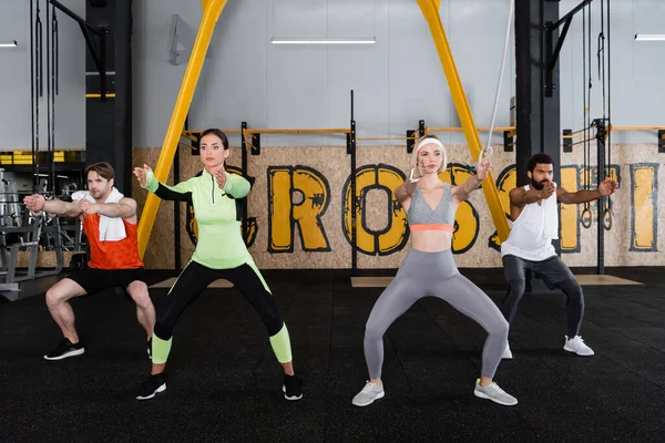Interracial Sportive People Training Awkward Yoga Pose Gym — Stock Photo, Image