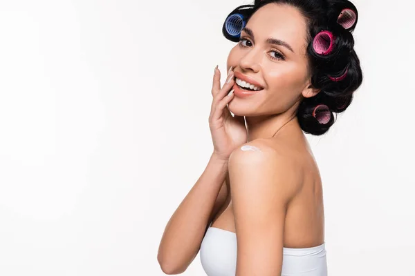 Smiling Young Woman Curlers Top Posing Applied Cream Shoulder Hand — Φωτογραφία Αρχείου