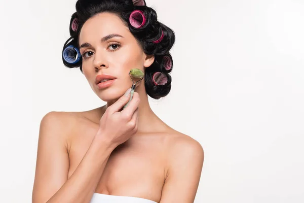 Serious Young Woman Curlers Making Facial Massage Jade Roller Isolated — Stock Photo, Image