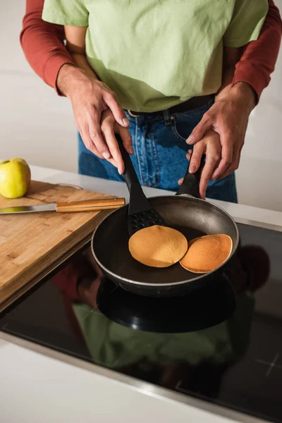 Cropped View Couple Preparing Pancakes Apple Cutting Board Kitchen — Stock Photo, Image