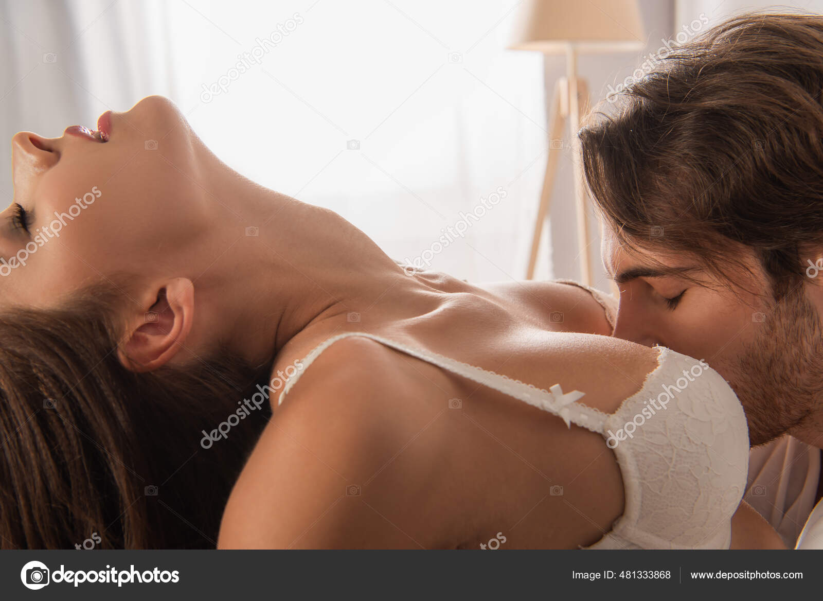 Side View Man Closed Eyes Kissing Breast Woman Sexy Body Stock Photo by ©Ischukigor 481333868