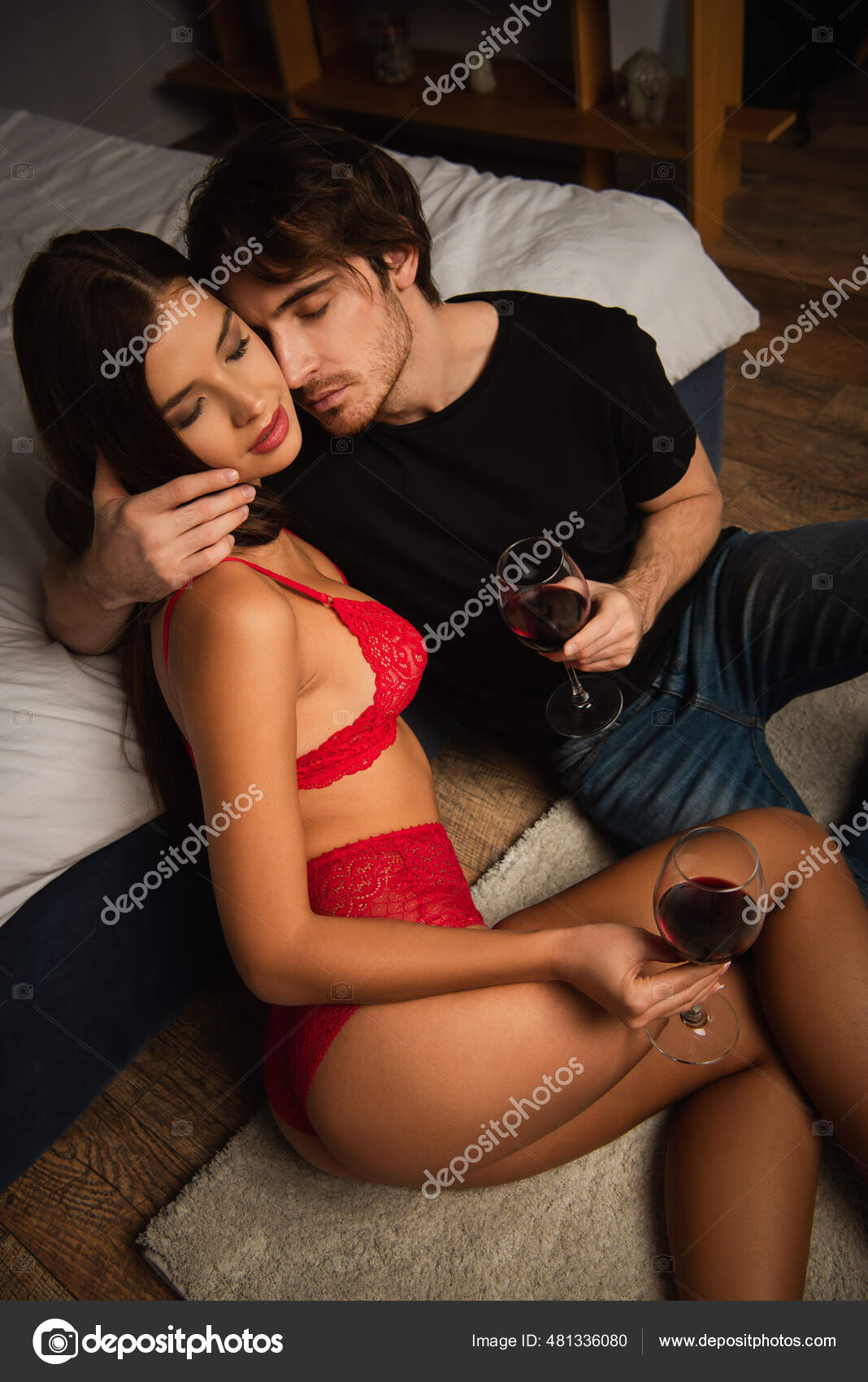 Young Man Embracing Seductive Woman Red Lingerie Floor Bedroom Stock Photo by ©Ischukigor 481336080 pic