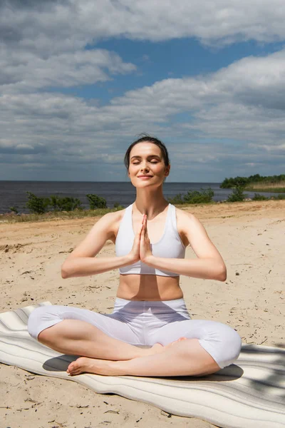 Brunette Young Woman Closed Eyes Sitting Lotus Pose Praying Hands — Stock Photo, Image