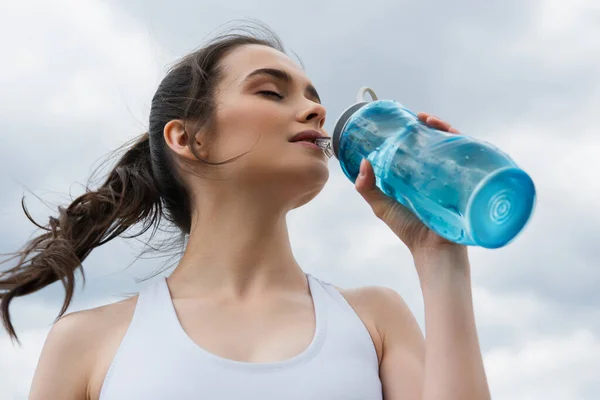 Low Angle View Young Woman Crop Top Drinking Water Blue — Stock Photo, Image