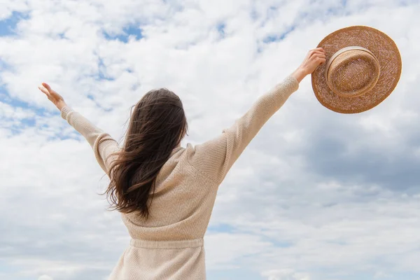 Back View Young Woman Standing Outstretched Hands Cloudy Sky — Stock Photo, Image