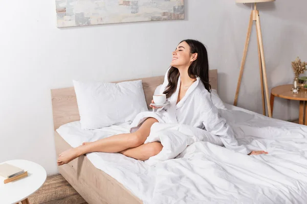 Happy Young Woman Holding Cup Coffee Saucer Bedroom — Stock Photo, Image