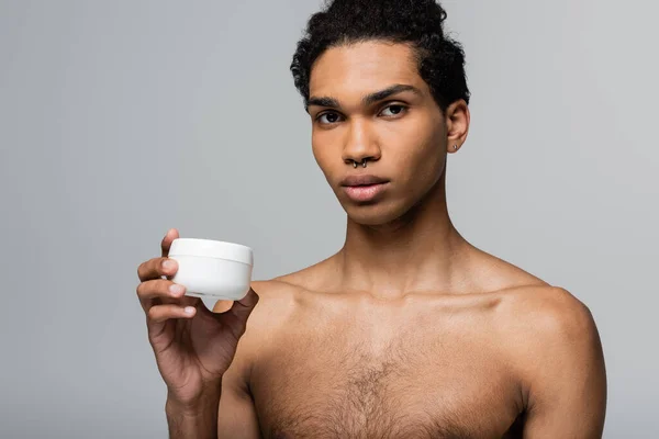 Shirtless African American Man Piercing Showing Container Cosmetic Cream Isolated — Stock Photo, Image