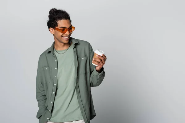 Joyful African American Guy Stylish Eyeglasses Looking Paper Cup Isolated — Stock Photo, Image