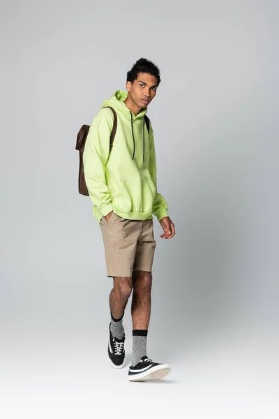 African American Man Green Hoodie Standing Hand Pocket Beige Shorts — Stok Foto
