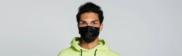 Young African American Man Black Medical Mask Isolated Grey Banner — Stock Photo, Image