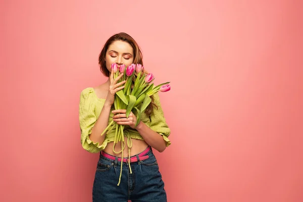 Pleased Woman Smelling Tulips Isolated Pink — Stock Photo, Image