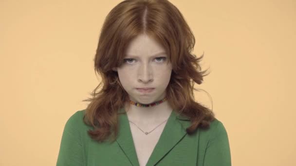 Offended Teenage Girl Red Hair Looking Camera Isolated Yellow — Stock Video