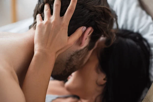 Blurred Woman Making Out Shirtless Man Bedroom — 스톡 사진