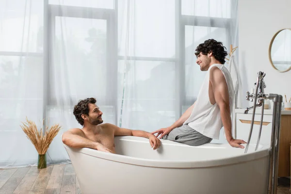 Happy Gay Man Looking Boyfriend Bathtub — Stock Photo, Image