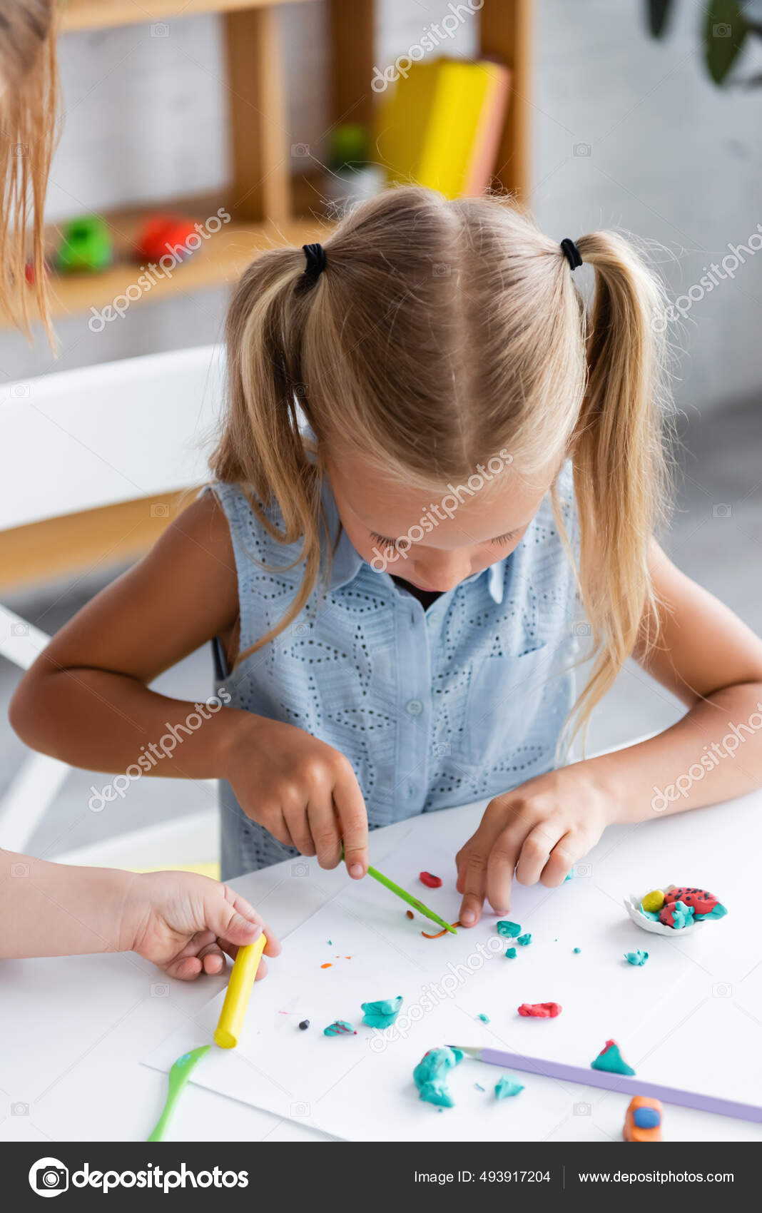 Blonde Preschooler Girl Molding Molding Plasticine Private Kindergarten