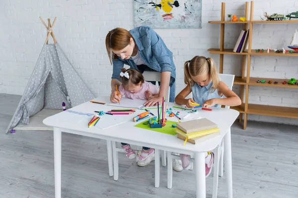 Teacher Assisting Disabled Girl Syndrome Drawing Preschooler Child Molding Plasticine — Stock Photo, Image