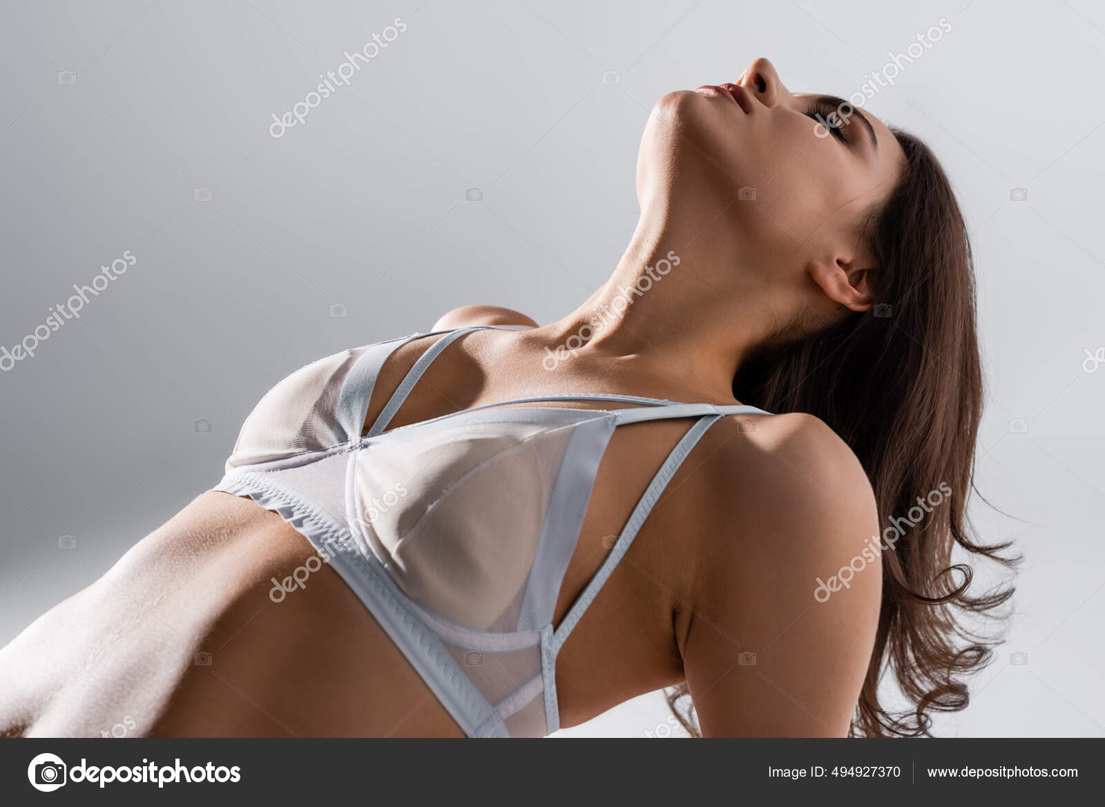 Sexy Woman Closed Eyes Silk Bra Posing Isolated Grey Stock Photo by  ©Ischukigor 494927370
