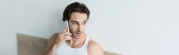 Brunette Man Looking Away While Talking Smartphone Morning Banner — Stock Photo, Image