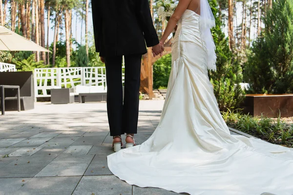 Cropped View Lesbian Couple Suit Wedding Dress Holding Hands Outdoors — Stock Photo, Image