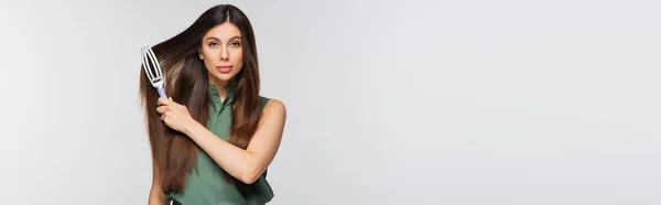 Young Woman Brushing Shiny Hair Isolated Grey Banner — Stock Photo, Image