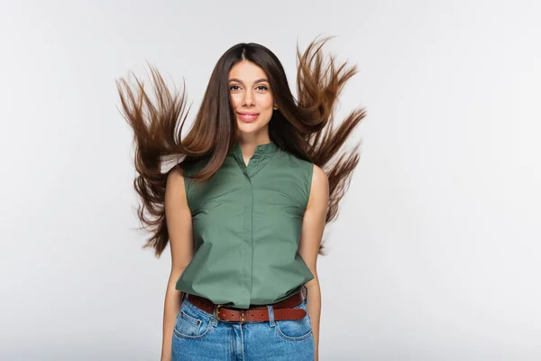 Happy Young Woman Shiny Hair Air Isolated Grey — Stock Photo, Image