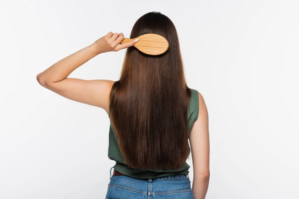 Gri Saçlarını Tarayan Genç Bir Kadının Arka Plan Görüntüsü — Stok fotoğraf