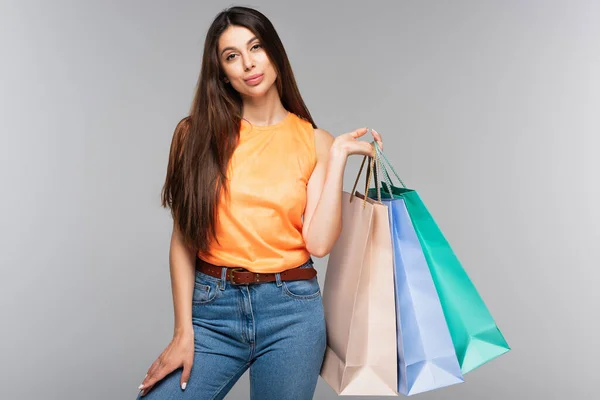 Brunette Young Woman Holding Shopping Bags Isolated Grey — Stock Photo, Image