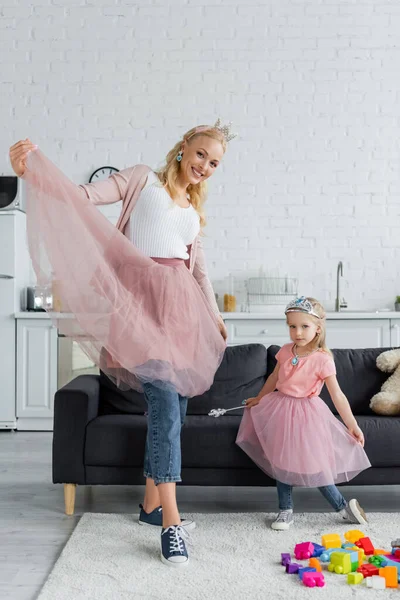 Cheerful Mom Daughter Toy Crowns Tulle Skirts Looking Camera While — Stock Photo, Image