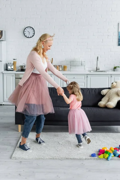 Happy Woman Daughter Costumes Princesses Dancing Kitchen — Stock Photo, Image