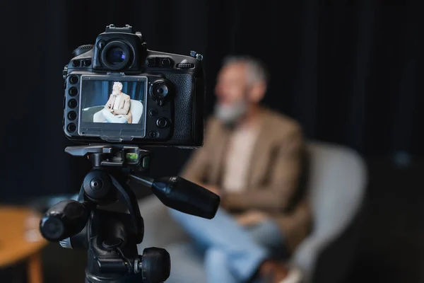 Digital Camera Tripod Businessman Sitting Armchair Screen — Stock Photo, Image