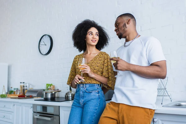 Smiling African American Woman Holding Wine Boyfriend Kitchen — Stock Photo, Image