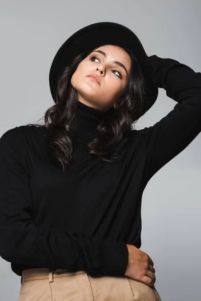 Brunette Young Model Holding Fedora Hat Looking Away Isolated Grey — Stock Photo, Image