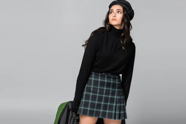 Young Trendy Woman Beret Plaid Skirt Holding Green Leather Jacket — Stock Photo, Image