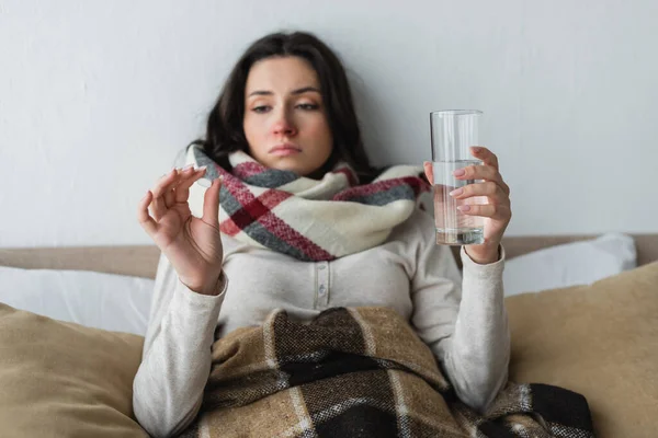 Diseased Sad Woman Lying Bed Glass Water Looking Pill — Stock Photo, Image