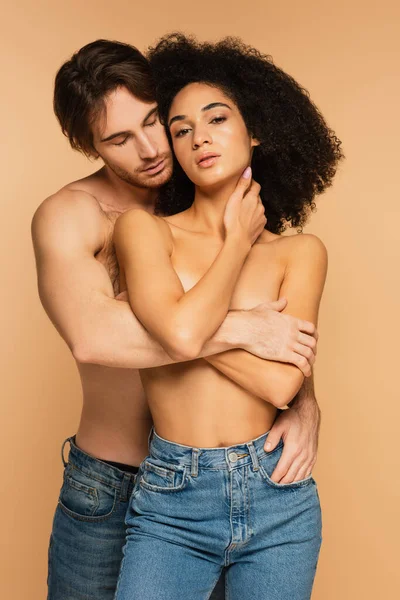 Sexy Man Embracing Topless Latin Woman While Holding Hand Pocket — Stock Photo, Image