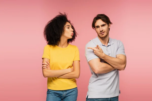 Offended Man Pointing Latin Girlfriend Standing Crossed Arms Grimacing Isolated — Stock Photo, Image