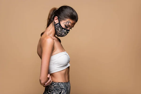 Woman Tiger Makeup Animal Print Protective Mask Looking Isolated Beige — Stock Photo, Image