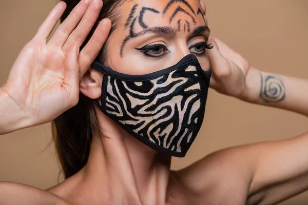 Young Model Tiger Makeup Animal Print Mask Looking Away Isolated — Stock Photo, Image