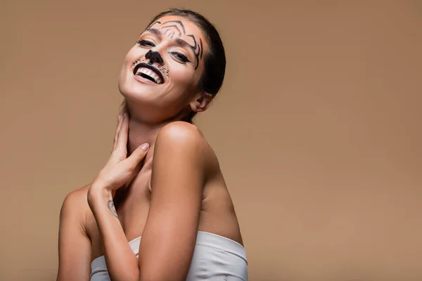 Young Positive Woman Bare Shoulders Tiger Makeup Posing Isolated Beige — Stock Photo, Image