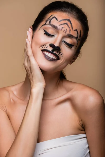 Joyful Woman Bare Shoulders Tiger Makeup Posing Isolated Beige — Stock Photo, Image