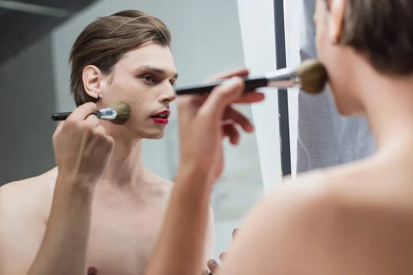 Young Transgender Man Applying Face Powder Mirror — Stock Photo, Image