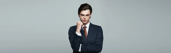 Young Androgynous Businessman Suit Posing Isolated Grey Banner — Stock Photo, Image