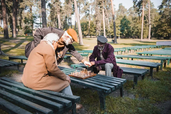 Elderly Multiethnic Men Playing Chess Benches Park — Stock Photo, Image