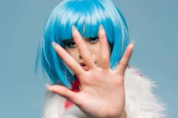 Asian Woman Wig Pulling Hand Camera Isolated Blue — Stock Photo, Image