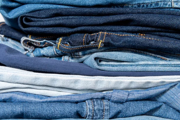 Close up view of stacked blue denim garments — Stock Photo