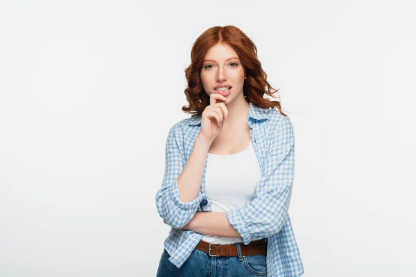 Thoughtful redhead woman in blue checkered shirt isolated on white — Stock Photo